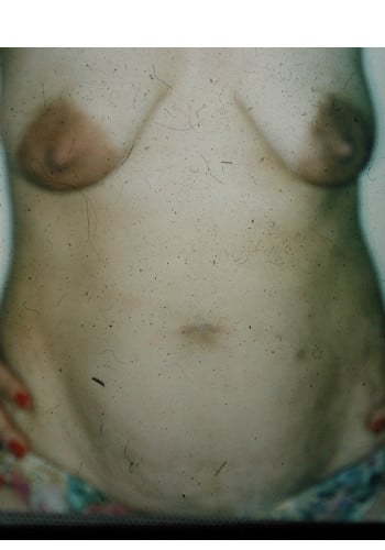 A woman with very large breasts and small breast