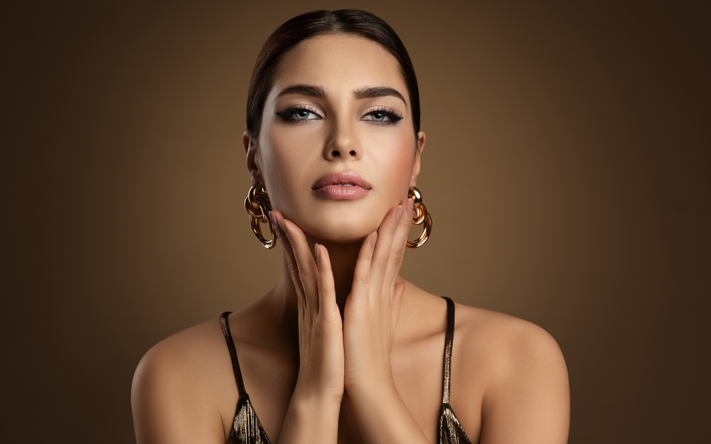 Woman shown in profile highlighting nasal shape and facial proportions.